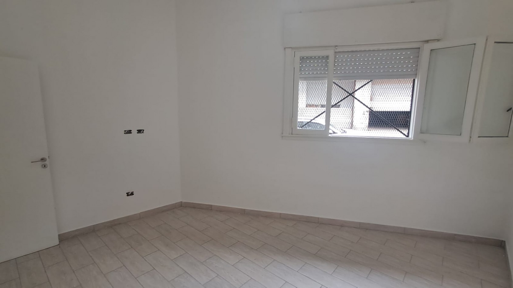 DEPARTAMENTO 2 AMB CON PATIO Y LOCAL CON DEPOSITO.REF.916
