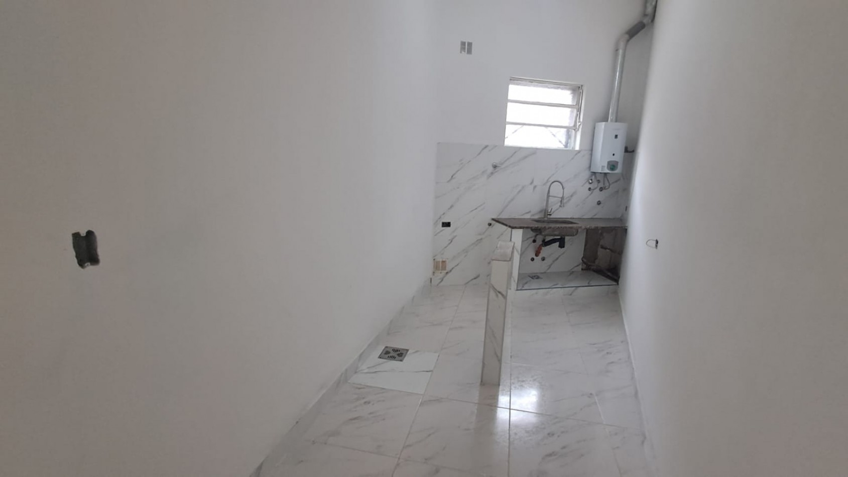 DEPARTAMENTO 2 AMB CON PATIO Y LOCAL CON DEPOSITO.REF.916